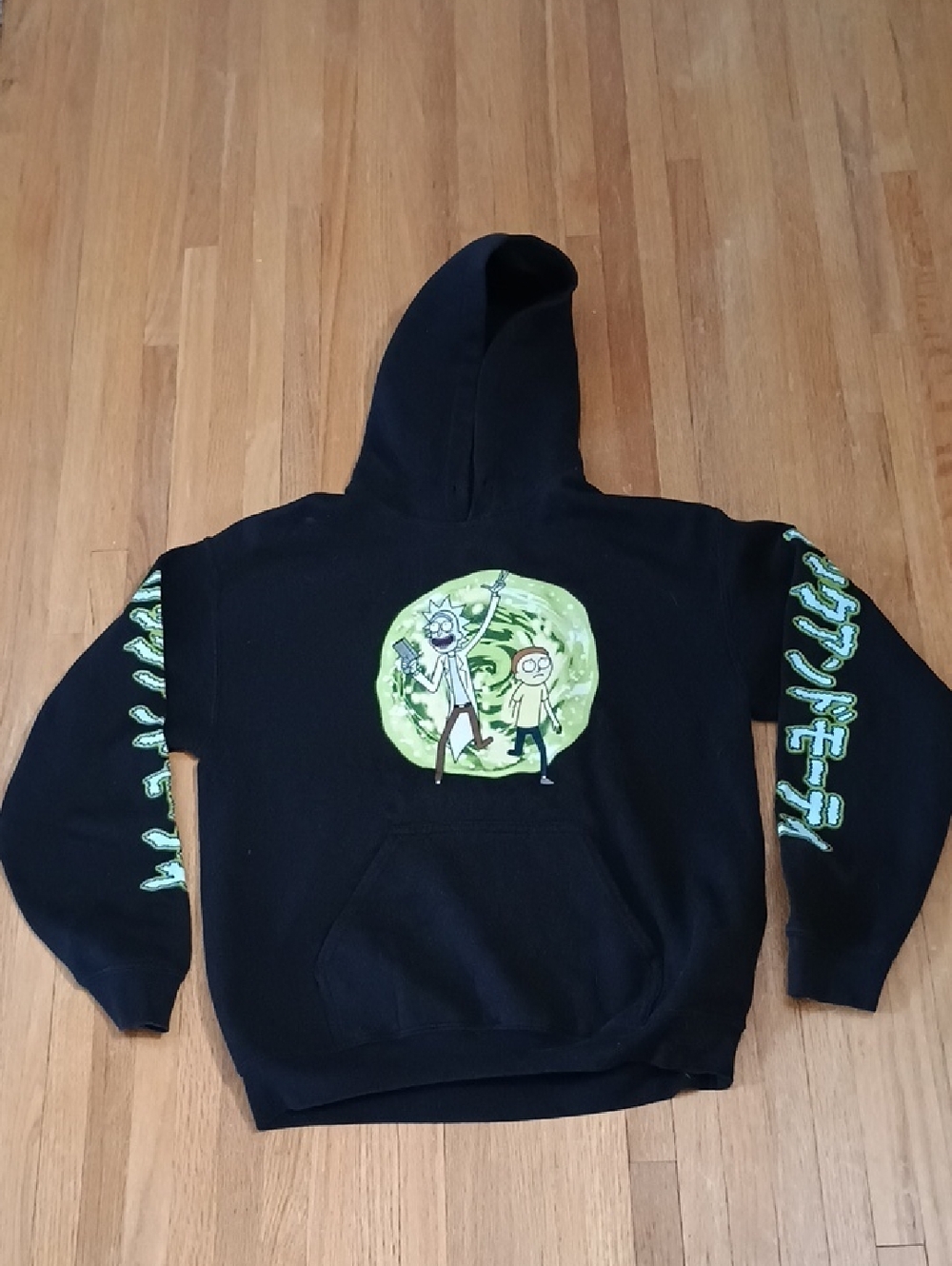 Cartoon Network Rick and Morty Black Hoodie with Green Portal Graphic